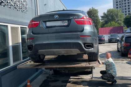 В Новосибирске должница банка прятала BMW X6 на СТО