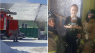 Новосибирские пожарные спасли семью с детьми из горящего дома