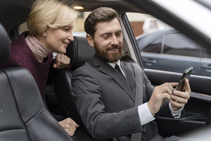 taxi-driver-female-client-interacting-formal-way.jpg